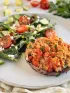 A plate with a very low carb keto meal of turkey stuffed mushroom and salad for diabetes friendly eating