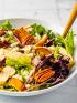 A colorful bowl of salad with homemade cider vinaigrette for a fall diabetes recipe