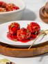 A plate with 3 turkey meatballs and cranberry sauce for diabetes friendly diet recipe