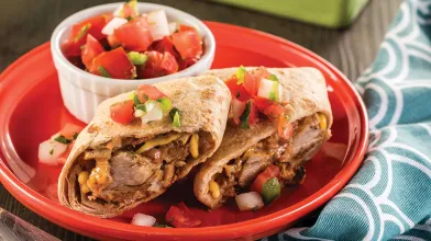 Ingrid Hoffmann's Carnitas Baked Chimichangas