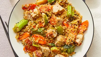 Pork & Freekeh Stir Fry with Brussels Sprouts, Carrots, and Shishito Peppers