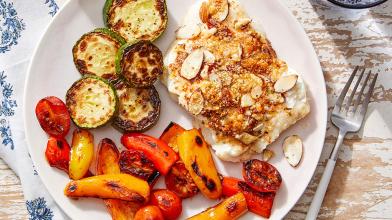 Parmesan-Almond Baked Cod with Sautéed Vegetables