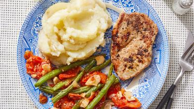 Tuscan-Spiced Pork & Mashed Potatoes with Green Beans and Roasted Tomato Dressing