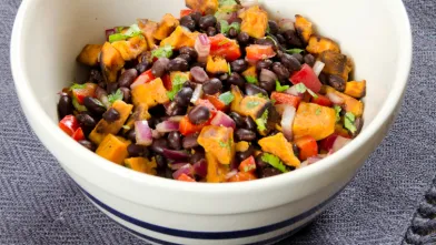A bowl of black bean and peach salsa
