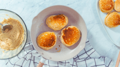 A pan with diabetes friendly sweet potato pancakes made with healthy whole wheat
