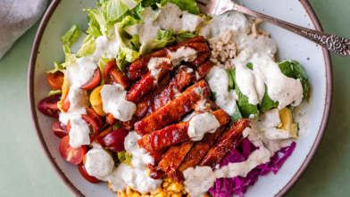 A plate of seared BBQ tempeh with a creamy salad for a diabetes friendly meal that is vegan vegetarian