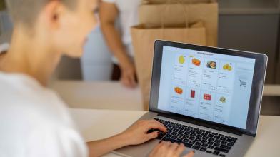 Woman doing online grocery shopping