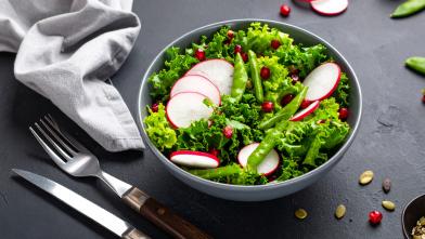 Harvest salad in bowl with radishes
