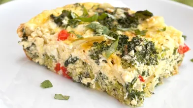 Hearty Breakfast Spinach frittata slice on a plate