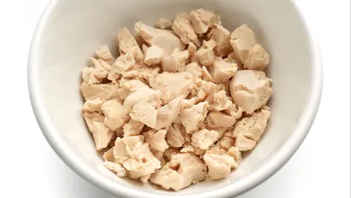 Bowl with cooked chicken breast