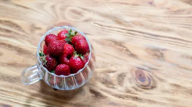 Fresh strawberries in a glass