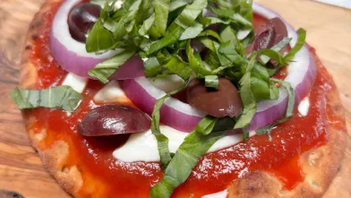 margherita pizza with vegetables on top