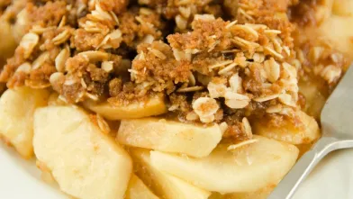 Apple and pear crisp with a golden oat crumble topping.
