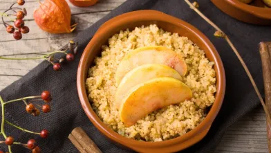 A bowl of apple cinnamon quinoa porridge
