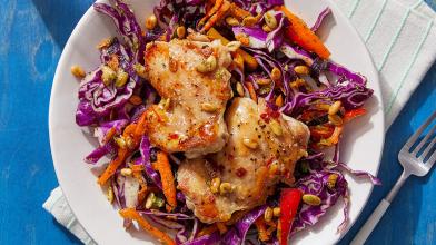 Mojo-Style Chicken Thighs with Cilantro Slaw and Garlic-Lime Pepitas