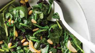 Sauteed Baby Spinach With Currants and Pine Nuts