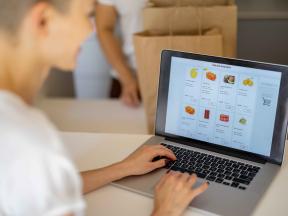 Woman doing online grocery shopping