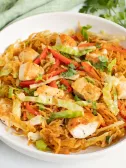 Chicken stir fry with lime wedge
