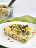 Hearty Breakfast Spinach frittata slice on a plate