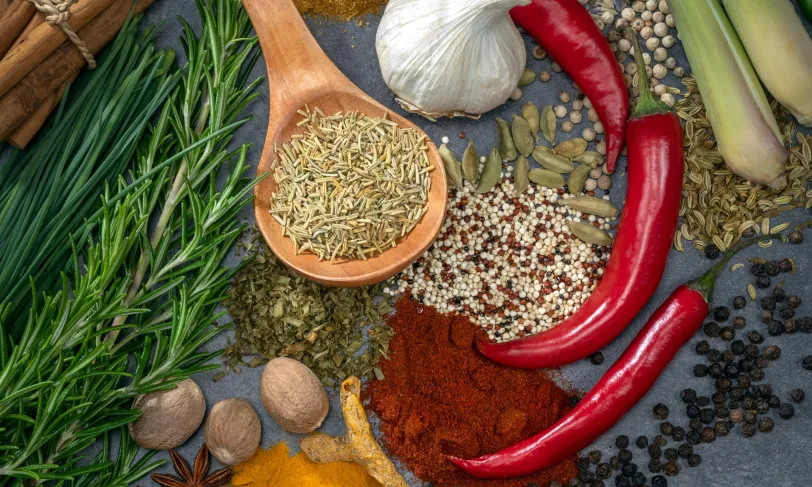 Overhead close-up of various spices and herbs