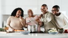 A family cooking healthy foods for a diabetic friendly diet