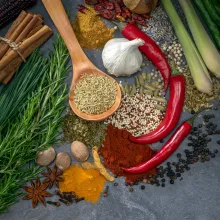 Overhead close-up of various spices and herbs