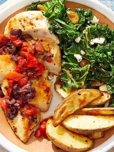 Greek Chicken & Potatoes with Sautéed Kale, Raisins & Feta Cheese