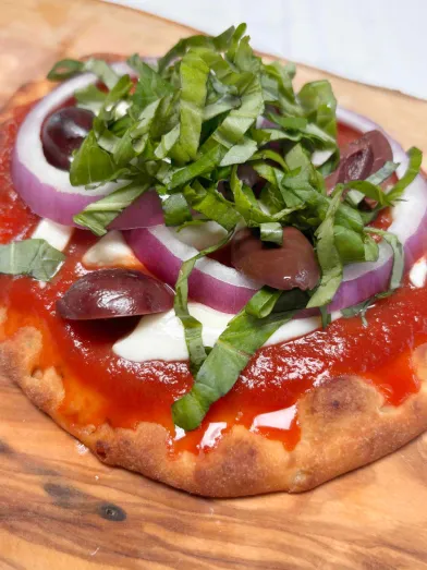margherita pizza with vegetables on top