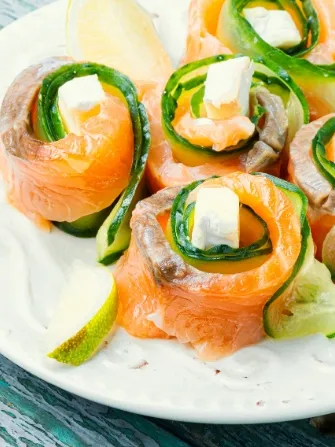 Photograph of salmon and cucumber rolls.