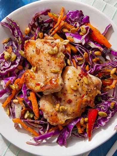 Mojo-Style Chicken Thighs with Cilantro Slaw and Garlic-Lime Pepitas