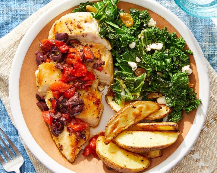 Greek Chicken & Potatoes with Sautéed Kale, Raisins & Feta Cheese