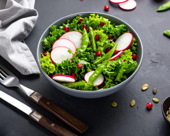 Harvest salad in bowl with radishes