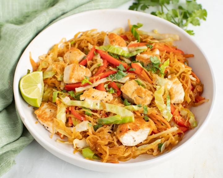 Chicken stir fry with lime wedge