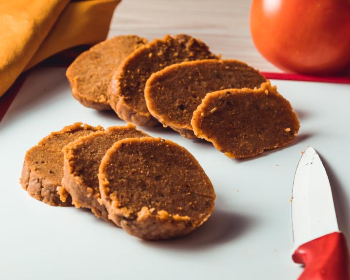 Sliced seitan on a cutting board