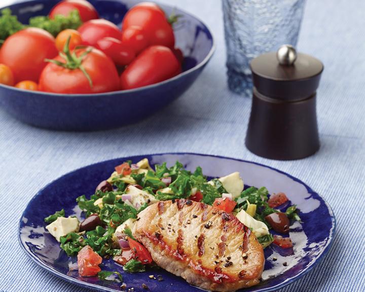 Grilled Pork With Tomato, Artichoke, And Kale Salsa