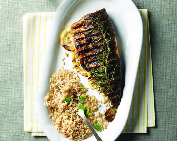 Grilled Trout With Fresh Herbs And Lemon Slices